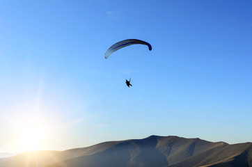 Paraglider against the sky.