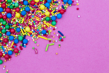 Colourful candy cake decorative sprinkles background