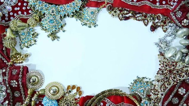Beautiful Indian Sari Clothing with Bridal jewelry. Frame for wedding invitation.  Oriental Fashion.