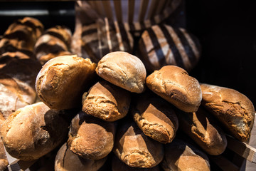 Fresh breads in bakery close-up detail