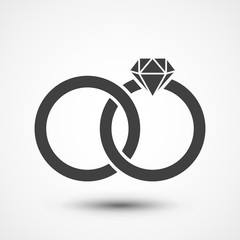 Two bonded wedding rings. Marriage icon. Diamond. Couple wedding anniversary. Bride jewelry
