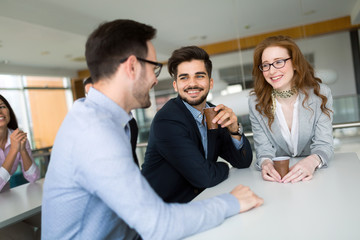 Business people having fun during break in an office