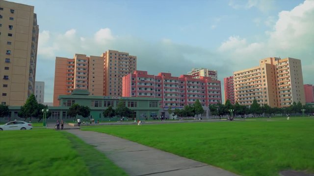 Ilyul 2018 - Pyongyang, North Korea - View from the window of a moving car on the central streets of the capital of North Korea - the city of Pyongyang. North Korea is one of the most closed countries