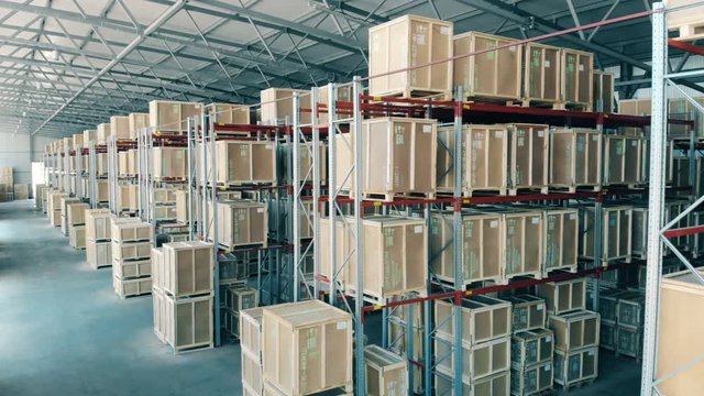 Spacious warehouse with racks.