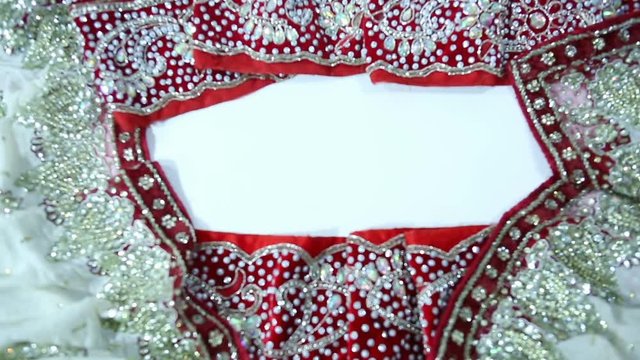 Beautiful Indian Sari Clothing with Bridal jewelry. Frame for wedding invitation.  Oriental Fashion.