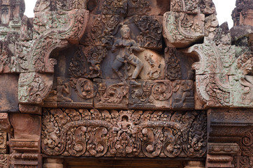 Carved stone decors on Bantai Srei buddhist temple in Angkor Wat park, Cambodia