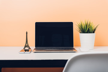Mock up laptop notebook computer on desk table