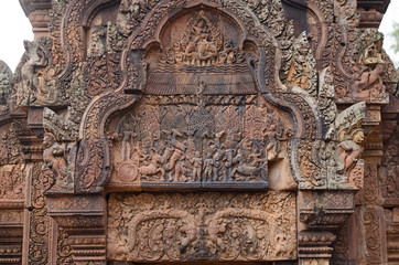 Carved stone decors on Bantai Srei buddhist temple in Angkor Wat park, Cambodia