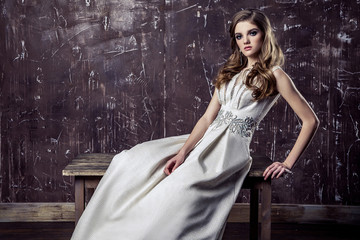 Obraz premium Young model posing in luxury wedding dress