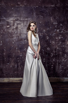 Young model posing in luxury wedding dress