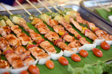 Barbecue on sticks are grilling. Barbeque on the grill.