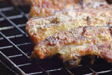 delicious food pork grilling on hot charcoal