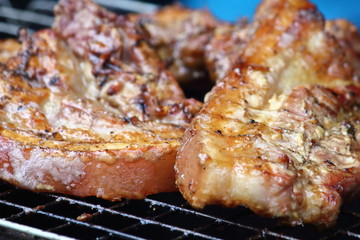 delicious food pork grilling on hot charcoal