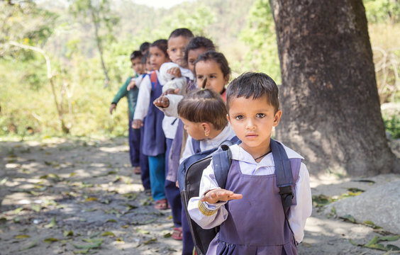 Govt Primary School Village Student Standing In Queue During Morning Assembly Outdoor.