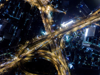 Aerial topdown view of night traffic in urban city.