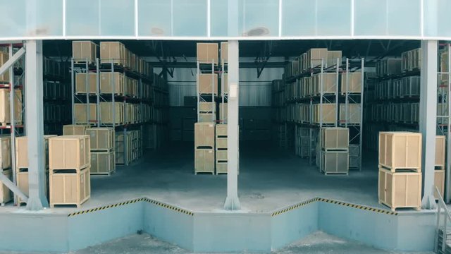 Open warehouse with boxes inside.