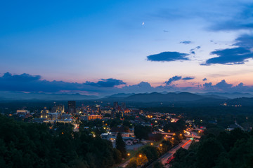 Twilight scene overlooking Asheville, a destination vacation mountain town in western North Carolina