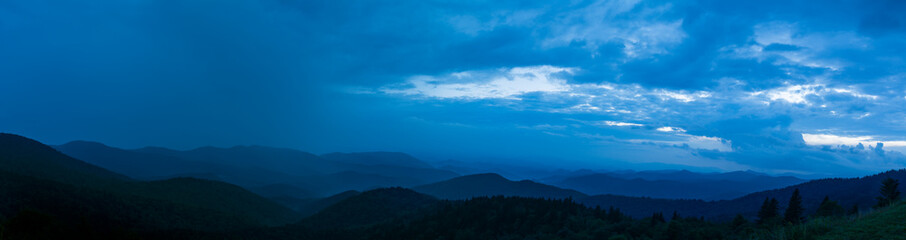 North Carolina mountains after sunset with a beautiful thunderstorm rolling in from the West