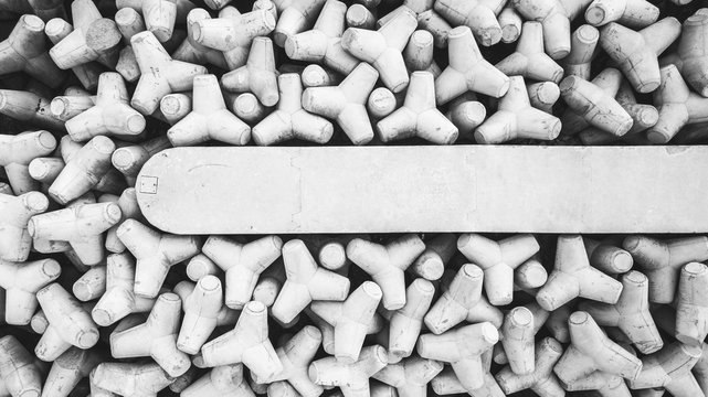 Top view of an abundance of concrete breakwater.