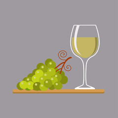 Wine glass and grapes, isolated on gray background