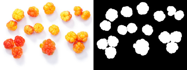 Cloudberries rubus chamaemorus, top, paths - obrazy, fototapety, plakaty