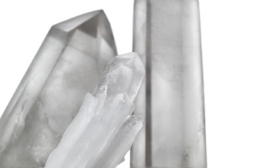 Large clear pure transparent great royal crystals of quartz chalcedony on isolated white background closeup
