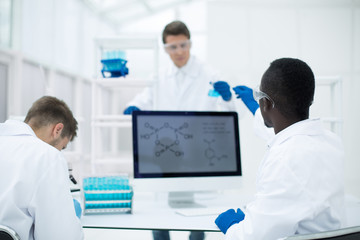 group of scientists working in the laboratory