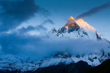 Machapuchare peak of Annapurna range at sunset 