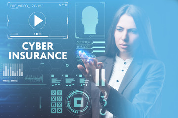 The concept of business, technology, the Internet and the network. A young entrepreneur working on a virtual screen of the future and sees the inscription: Cyber insurance