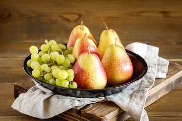 Fresh Fruits Green Grapes Pears Autumn Fruits Black Plate Wooden Background Horizontal