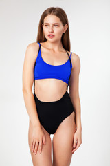 Fototapeta premium Beautiful happy woman in stylish bikini