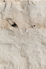 Background geology closeup limestone rock face showing weathered strata wallpaper