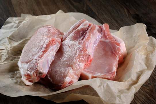 Raw pork steaks on bone