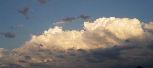 High Rolling Cumulus Clouds in a Blue Sky