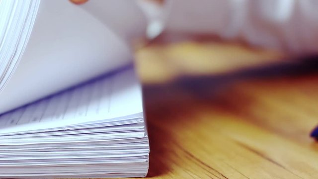 Businessmen are searching for documents lying on the table,business report papers,important documents.