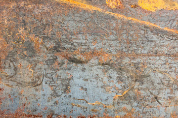 A piece of steel showing the process of its oxidation. Rust creating various patterns.
