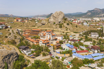 Fototapeta na wymiar Top view of the old seaside town in a mountainous area.Crimea.