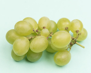 
White grapes on colorful backgrounds
