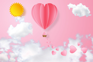 Obraz na płótnie Canvas The hot air heart balloon on pink sky and sunny as love, happy valentine's day, wedding and paper art concept. vector illustration.