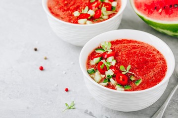 Watermelon and Tomato Gazpacho in white bowls.