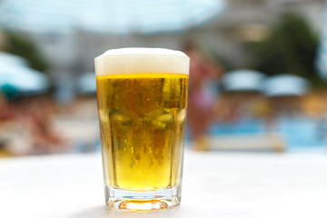 A glass of cold frothy beer