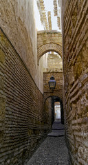Alley with stone houses of Cordoba, Spain - Italy