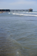 Fototapeta na wymiar Wooden pier at the ocean