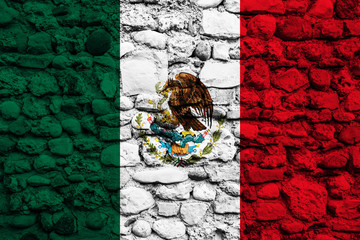 Mexico flag on pebble wall