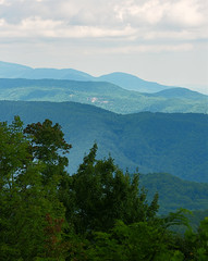 Several ridges of mountains from an overlook.