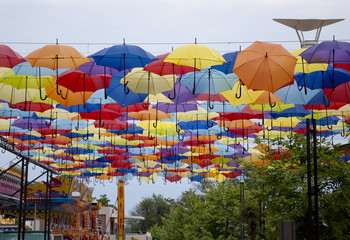 Street decorated with colored umbrellas in Odessa, Ukraine - obrazy, fototapety, plakaty