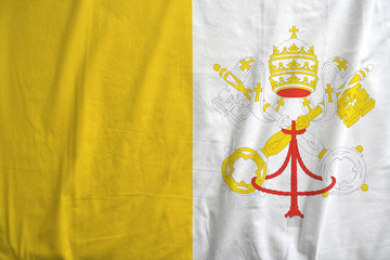 Flag of Vatican City waving.