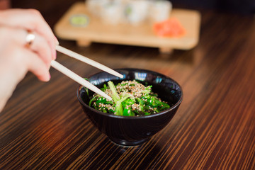 A plate of green seaweed