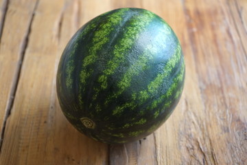 Watermelon on wooden table