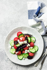 Watermelon cucumber feta salad with balsamic dressing. Top view, copy space.